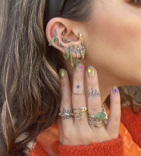 Green Ear Curation, Colorful Ear Stack, Maximalist Ear Piercings, Ear Stacking Ideas Grunge, Maximalist Ear Stack, Ethereal Jewelry, Stained Glass Earrings, Cool Ear Piercings, Ear Party