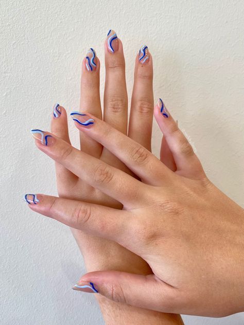 Nail Inspo Line Art, Nails Blue Swirls, Indigo Blue Nails Design, Almond Nails Wavy Design, French With Swirl Nails, Blue 70s Nails, Gel Nail Line Designs, White Abstract Nail Art, Blue And Green Nail Art Designs