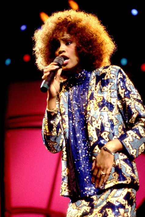 Pin for Later: Remember Whitney Houston With a Look at Her Life in Pictures  Whitney performed in 1986 in Chicago. Whitney Houston Singing, Cissy Houston, Gospel Singer, Pop Hits, Black Hollywood, Cheetah Print Dress, Music Theater, Whitney Houston, Young And Beautiful