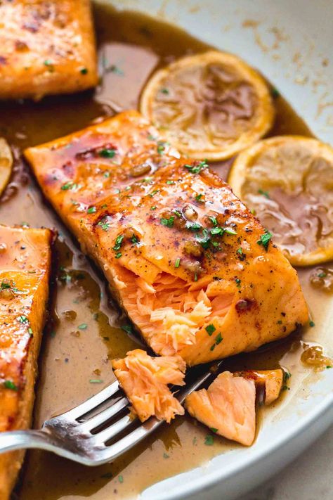 Honey Garlic Salmon is the easiest fish dinner you’ll ever make! It’s perfectly flaky with a sweet and salty honey soy glaze with lemon juice and melted butter. Honey Old Bay Salmon, Seafood Entree, Salmon Recipe Pan, Easy Fish Dinners, Salmon Recipes Oven, Soy Glaze, Best Salmon Recipe, Recipes With Soy Sauce, Seafood Dinner Recipes