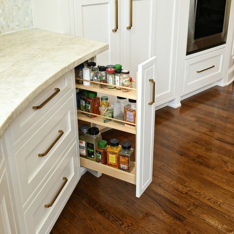 Pull-out spice drawers are one of our favorite “hidden gems” in our kitchen designs! This award-winning kitchen is filled with many thoughtful details and creative storage solutions. #KitchenDesign #AtlantaKitchens #SpiceDrawer #CustomCabinets #SKBI Spice Drawers, Award Winning Kitchen, Mediterranean Kitchen, Spice Drawer, Creative Storage Solutions, Spice Bottles, Spice Box, Creative Storage, Pull Out Drawers