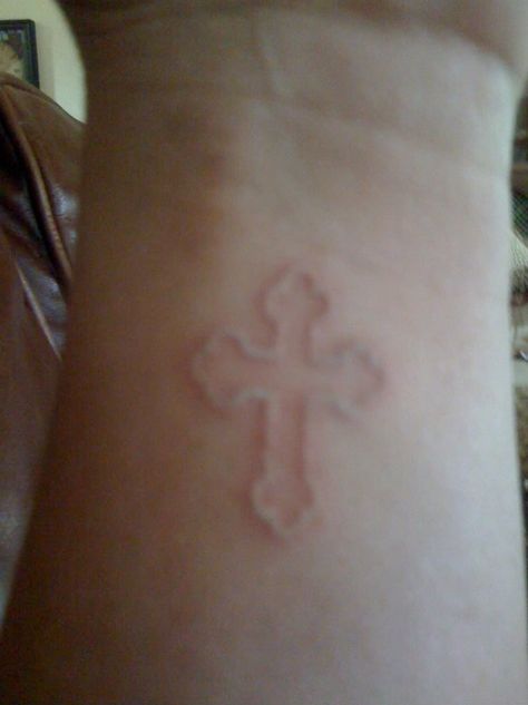 White cross <3 White Ink Cross Tattoo, Pale Tattoo, White Ink Tattoo On Pale Skin, White Cross Tattoo, White Cybersigilism Tattoo, Cybersigilism Cross Tattoo, Cross Y2k Tattoo, White Tattoo Ideas, Grunge Cross Tattoo