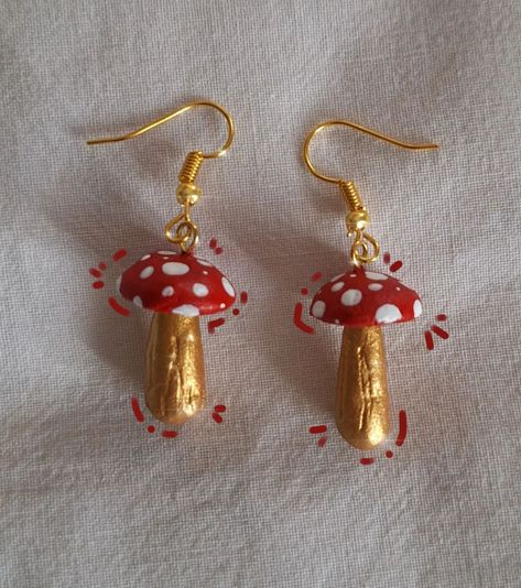 New mushroom earrings!🍄 • #handmade#earrings#mushrooms#cottagecore#smallbusiness#fairycore {Handmade, mushroom earrings, cottagecore, smallbusiness, clay} Mushroom Earings, Mushrooms Cottagecore, Cute Mushroom Design Dangle Earrings, Cute Handmade Mushroom-shaped Earrings, Nature-inspired Mushroom Design Dangle Jewelry, Nature-inspired Dangle Earrings With Mushroom Design, Earrings Cottagecore, Fairy Earrings, Mushroom Earrings