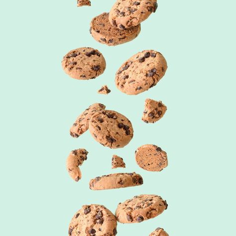 Chocolate chip cookie floating on a green background. Aesthetic sweet food concept. Flying chocolate biscuits Cookies Background, Biscuit Photography, Cookie Background, Cookies Background Design, Cookie Ads, Cookies Poster, Cookies Wallpaper, Cookies Advertising, Cookie Photography Styling Minimalist