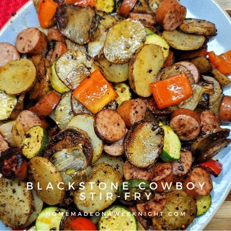 Blackstone Cowboy Stir-Fry - Try out this great meat and potatoes meal with veggies made right on the flat top griddle Blackstone Grill Stir Fry, Beef Stir Fry On Blackstone Griddle, Black Stone Veggies Ideas, Blackstone Griddle Potato Recipes, Black Stone Vegetables, Blackstone Sausage Recipes, Hot Dog Stir Fry, Potato Stir Fry Recipes, Blackstone Cowboy Stir Fry