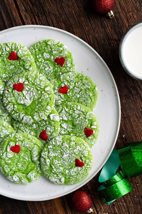 These easy grinch cookies are made with cake mix and a whole lot of love - who would have thought! A pinch of green and candy heart sprinkles brings vibrancy and life to these festive Christmas cookies. The Grinch Cake, Grinch Cookie, Green Cookies, Grinch Cake, Favorite Christmas Desserts, Grinch Heart, Grinch Cookies, Grinch Party, Vanilla Cake Mixes