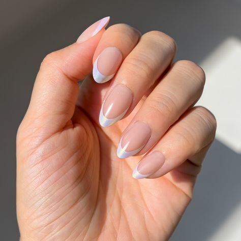 French Opal an iridescent french tip adds a touch of enchantment to the classic It Girl french tip. Achieve ethereal nails with this captivating set from our Fairytale Collection. EACH SET INCLUDES:• 30 Reusable Gel Nails (15 sizes per hand)• Non-Damaging Glue• 30 Piece Adhesive Tabs• Cuticle stick• Dual-sided nail file• Alcohol Prep Pad Coloured French Nails Tips Short, Iridescent French Tip, Ethereal Nails, Colored French Nails, French Manicures, French Tip Nail Designs, Basic Nails, Simple Acrylic Nails, Cute Gel Nails