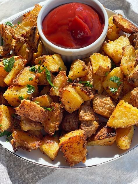 How to Make Crispy Potatoes in the Oven (TikTok Potato Hack) - Chop Happy Crispy Pub Potatoes, Crunchy Breakfast Potatoes, How To Make Crispy Potatoes, Crispy Fried Potatoes Skillet, Crunchy Potato Recipes, Crunchy Potatoes In Oven, Crispy Diced Potatoes, Crispy Potatoes In Oven, Crispy Potato Bites