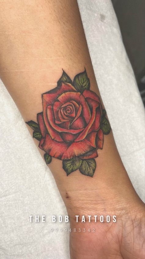 Colored Rose Tattoo | THE BOB TATTOOS | NOIDA #rose #rosetattoo #rosetattooideas #rosetattoodesign #flowertattoo #flowertattoodesigns #flowertattooideas #tattooforwomen #besttattoosforwomen #besttattooideas #handtattoo #handtattoosforwomen #forarmtattoo #armtattoo #wristtattoo #thebobtattoos Coloured Rose Tattoo, Beauty And The Beast Rose Tattoo, Rose Tattoo On Arm, Cute Tattoos On Wrist, Rose Hand Tattoo, Rose Shoulder Tattoo, Rose Tattoos For Women, Small Rose Tattoo, Matching Sister Tattoos