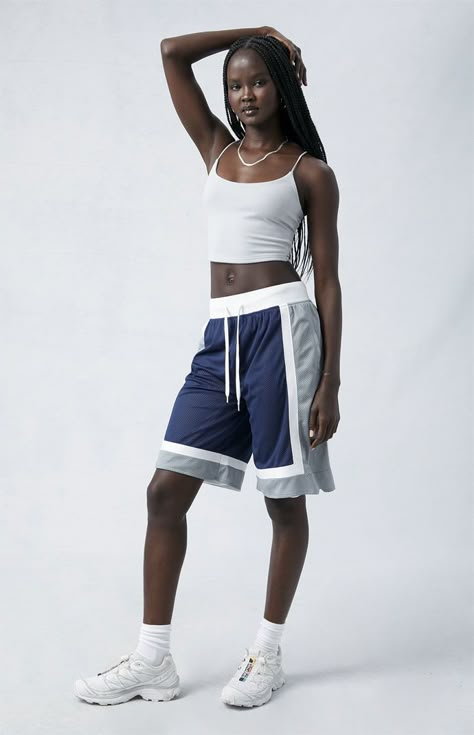 Relax this season and rock PacSun's Colorblock Longline Basketball Shorts. Featuring an extended length for a boyfriend fit, these mesh shorts effortlessly blend sporty style and comfort, making them a must-have for your rotation.   	Colorblock design 	12.5" rise 	10" inseam 	Lined 	Can be worn low or high on the waist 	Drawstring waistband 	Side hand pockets 	Longer inseam 	Mesh fabric 	Machine washable 	Model is wearing a size small 	Model measurements: 5’7” height, 30” bust, 23” waist, 33” hip Long Basketball Shorts Outfits Women, Basketball Shorts Gym Outfit, White Basketball Shorts Outfit, Mesh Basketball Shorts, Basketball Shorts Outfit Women Style, Basketball Shorts Women Outfit, Track Shorts Outfit, Long Basketball Shorts, Basketball Shorts Outfit