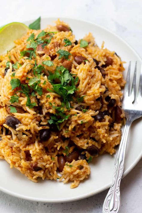 Instant Pot Rice and Beans | Made from canned beans Instant Pot Beans And Rice, Instant Pot Rice And Beans, Pinto Beans And Rice, Instant Pot Rice, Cajun Rice, Vegan Instant Pot Recipes, Seasonal Eating, Tomato Rice, Rice And Beans