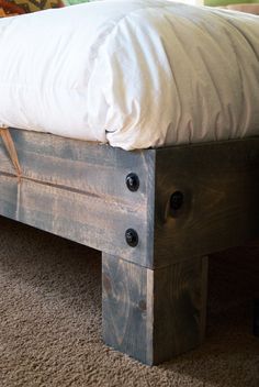 Love the base of this DIY bed! However,you do not want to use a solid piece of plywood under your mattress because a mattress needs to breathe so it doesn't mold. Salvaged Door, Door Headboard, Diy Platform Bed, Bed Platform, Diy Bed Frame, Bed Plans, Wood Beds, Wooden Bed, Diy Bed