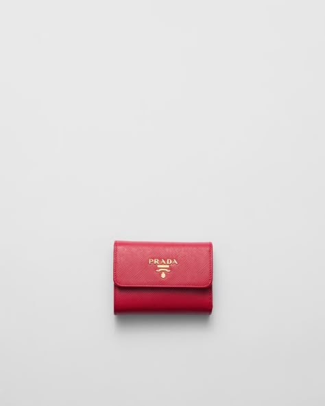 Fiery Red Small Saffiano Leather Wallet | PRADA Dream List, Red Wallet, Luxury Wallet, Prada Wallet, Fiery Red, Airport Fashion, Types Of Bag, 2025 Vision, Metal Logo