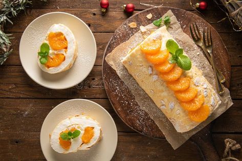 Meringue roll cake with cream, tangerine royalty free stock images Meringue Roll, Dessert Birthday, Christmas Dessert, Roll Cake, Cake Images, Ceramic Plate, Sweet Desserts, Pavlova, Christmas Desserts