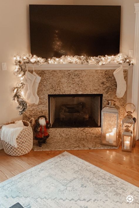 #holidaydecor #christmasdecor #fireplacemantel #garland #lanterns Follow my shop @theoriginalwhit on the @shop.LTK app to shop this post and get my exclusive app-only content! #liketkit #LTKhome #LTKHoliday #LTKSeasonal @shop.ltk http://liketk.it/3st4F Lantern Fireplace Decor, Lantern Fireplace, Lanterns Fireplace, Holiday Fireplace, Fireplace Mantel, Fireplace Decor, Fireplace Mantels, Lanterns, I Shop