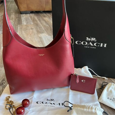 Up For Your Consideration Today Is A Brand New Tiktok Trending! Coach Brooklyn 28 In The Sold Out Ruby Color! Included Is Matching Coach Mini Skinny & Cherry Bag Charm. This Is The "It" Bag Of The Season, Absoulutly Stunning! This Coach Brooklyn 28 Shoulder Bag Is A Stylish Addition To Any Outfit. With A Solid Pattern And Magnetic Snap Closure, This Medium-Sized Bag Is Perfect For Everyday Use. The Exterior Is Made Of Beautiful Leather In A B4/Ruby Color, While The Interior Lining Is Also Made O Coach Brooklyn, Cherry Bag, Fancy Things, Ruby Color, It Bag, Medium Sized Bags, Coach New York, Bag Charms, Fall Fits