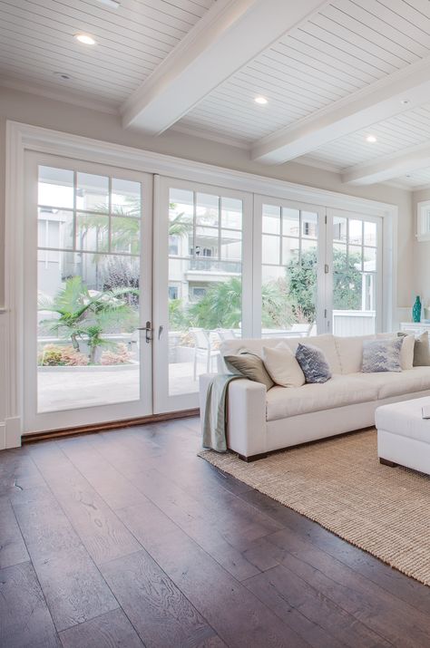 Open up your home to the outdoors! #foldabledoors #foldabledoor #indooroutdoor #largewallofwindows #wallofwindows #whiteinterior #moderncountry #whitetrim #whitetrimdoors #whitedoors #patio #patiodoor #foldabledoor #foldingdoor #kolbewindowsanddoors #kolbewindows French Doors To Patio From Living Room, Beach House Sliding Glass Doors, Multislide Patio Doors, Large Patio Doors Living Room, Large Glass Patio Doors, Double French Doors Living Room, Coastal Pool House, Folding Glass Patio Doors, Foldable Doors