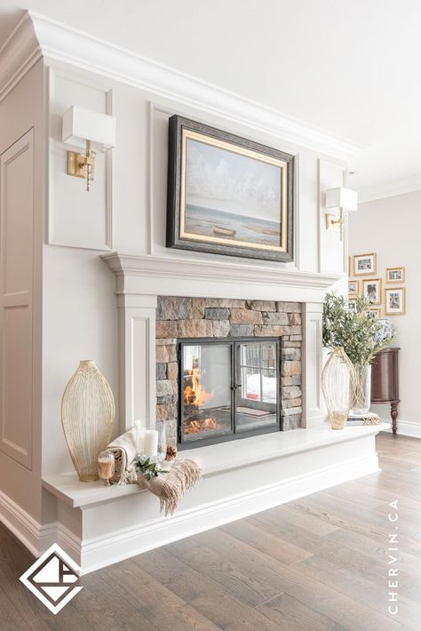 Custom white cabinetry handcrafted for a fireplace mantel. White Molding Fireplace, Stone Fireplace With Crown Molding, Crown Molding Fireplace, Traditional Crown Molding, White Fireplace Mantel, Traditional Mantle, Fireplace Molding, White Fireplace Mantels, Traditional Fireplace Mantel