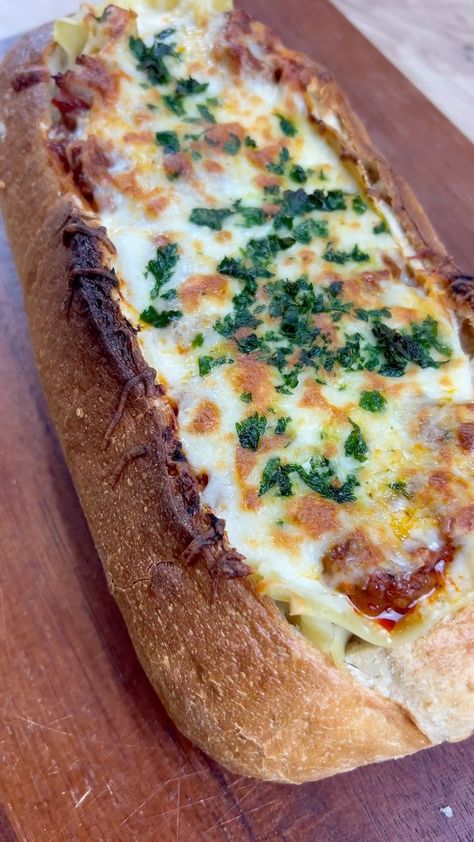 cookinwithmegg on Instagram: Lasagna…in a bread bowl? Count me in. Garlic Bread Lasagna Sandwich, Lasagna In French Bread, Lasagna Bread Bowl Recipe, Lasagna Stuffed French Bread, French Bread Lasagna, Bread Lasagna Recipes, Lasagna Bread Bowls, Camping Lunches No Cook, Lasagna In Bread Loaf