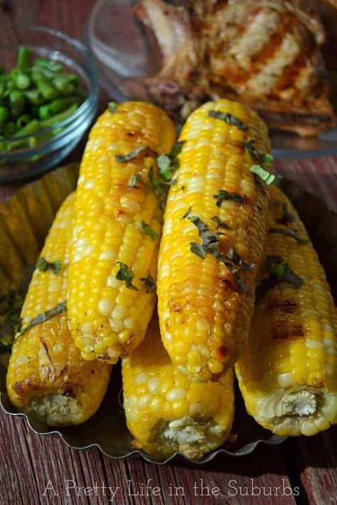 Basil Butter Roasted Corn on the Cob - A Pretty Life In The Suburbs Brown Sugar Rib Rub, Classic Spinach Dip Recipe, Roasted Corn On The Cob, Classic Spinach Dip, Cream Puffs Easy, Christmas Ham Recipes, Basil Butter, Caprese Bites, Cajun Butter