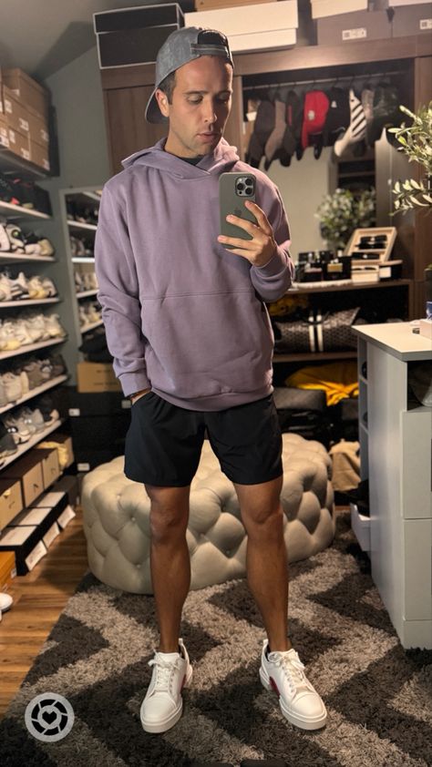 Guy Standing in closet wearing purple ash colored lulu lemon steady state hoodie black 5 inch mens lulu lemon shorts grey lulu lemon hat  and white Christian Louboutin leather sneakers with red bottoms Lululemon Guys Outfits, Mens Lululemon Shorts, Men’s Lululemon, Men’s Lululemon Outfit, 5 Inch Shorts Men, Mens Athletic Outfits, Lululemon Outfit Men, Lululemon Men Outfit, Mens Lululemon Outfit