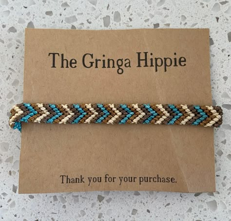 "This woven friendship bracelet features the classic chevron pattern in four colors.  The bracelet can be made as pictured (in teal, cream, tan and brown) or in any 4 colors of your choice.   Width: just short of 1/2\" (7/16\")" Chevron Friendship Bracelets Colors, Chevron Bracelet Color Ideas, Brown Friendship Bracelet, String Friendship Bracelets, Chevron Friendship Bracelet, Chevron Friendship Bracelets, Bracelet Colors, Western Bracelets, Diy Friendship Bracelet