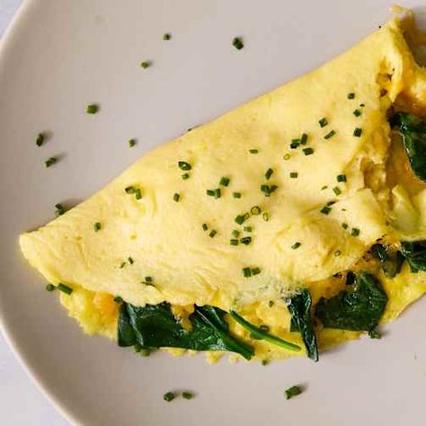 Omelet Recipes & Ideas | The Kitchn Omelet Recipes, Oven Cooked Bacon, Berry Fruit Salad, Spinach Omelet, Homemade Italian Dressing, Spinach Cheese, Omelets Recipe, Roasted Radishes, Crispy Cheese