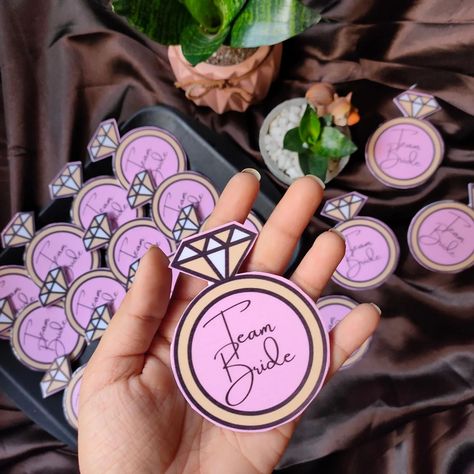 Team bride badges for the wedding season 🫶 Can be customised as per requirement 🤍 WhatsApp 9679727880 to place your orders! #weddingbadges #weddingbadge #badge #brooch #customizedbadge #teambride Team Bride Badges, Brides Sister, Wedding Badges, Wedding Brooches, Earrings Ideas, Wedding Brooch, Engagement Ideas, Origami Tutorial, Team Bride