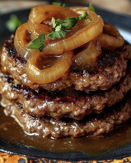 Hamburger Steaks with Onion Gravy Hamburger Steaks With Onion Gravy, Onion Gravy Recipe, Beef Patties Recipes, Hamburger Steaks, Salisbury Steak Meatballs, Slow Cooker Salisbury Steak, Steak And Onions, Easy Hamburger, Hamburger Steak