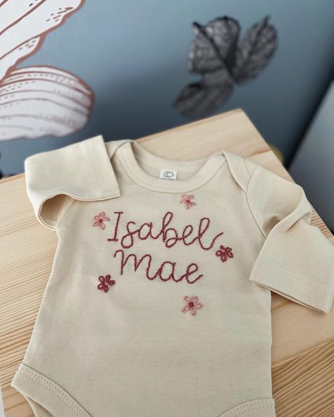 Absolutely ADORE the flower request on this newborn onesie! PLEASE always request special customizations- I’d love to make something personal for you! #newbornbodysuit #newbornonesie #custominesie #customembroidery #handembroidery Embroidered Baby Onesie, Newborn Baby Onesies, Embroidered Onesie, Newborn Bodysuit, Newborn Onesies, Name Embroidery, D Love, Baby Projects, Custom Embroidery