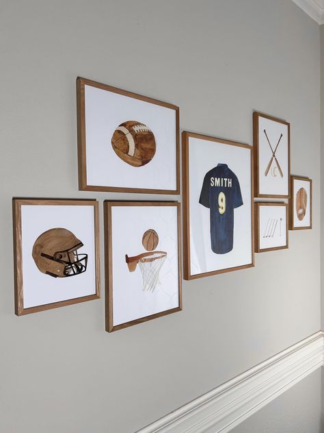 This personalized watercolor sports theme art print set is a beautiful piece of gallery wall decor that would make a perfect addition to any space. This wall art would make a great gift for anyone who loves sports lifestyle, and it would be an ideal choice for a housewarming, birthday and or nursery. The watercolor style of the prints add a softer, more artistic touch, making it a unique and eye-catching piece of decor. Various sports including basketball, football, baseball, golf and a personal Vintage Sports Bathroom, Sports Nursery Theme Vintage, Home Office Sports Theme, Vintage Sports Wall Art, The Office Nursery Theme, Boys Room Baseball Theme, Vintage Sports Prints, Toddler Boy Sports Bedroom, Sports Baby Nursery