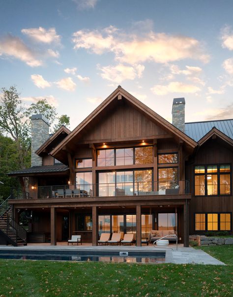 Lakefront Lodge | Stonewood Dark Lake House, Rustic Modern Lake House, Lodge Style Homes Exterior, Log Cabin Lake House Exterior, Wooden Lodge House, Modern Lodge Style Home Exterior, Lodge Great Room, Lake Houses Exterior Big Windows, Lodge Exterior