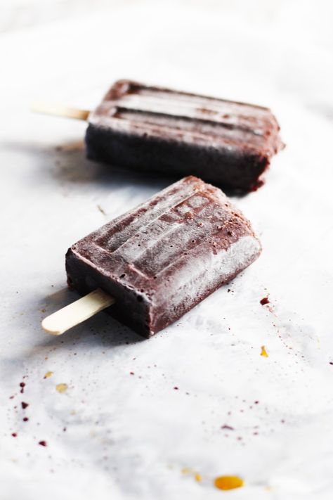 Black Forrest Popsicles with Dark Chocolate Almond Milk. A decadent but healthy Summer Popsicle recipe. Dark chocolate almond milk, extra cocoa and dark cherries make for a rich, chocolatey guilt-free dessert. You are welcome! | FusionCraftiness.com Vegan Frozen Dessert, Fudgesicle Recipe, Summer Popsicle Recipes, Dairy Free Fudge, Vegan Popsicles, Healthy Popsicle Recipes, Chocolate Popsicles, Fudge Pops, Chocolate Almond Milk