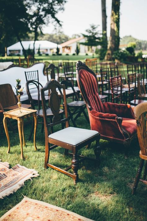 This Wedding at The Venue at Tryphena’s Garden Makes Antique Details Feel Totally New Vintage Wedding Isles, Thrifted Wedding Chairs, Vintage Chairs Wedding, Mismatched Wedding Chairs, Vintage Thrift Wedding, Vintage Wedding Seating, Appalachian Wedding, Tables With Flowers, Vintage Eclectic Wedding