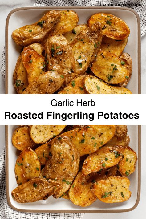 These easy roasted fingerling potatoes are wonderful with their crisp golden brown edges and creamy insides. After they finish roasting in the oven, I toss the potatoes with roasted garlic and a mix of fresh herbs including rosemary, parsley, thyme and chives. Roasting garlic cloves mellows their flavor to balance with the herbs. Finger Potatoes, Roasting Garlic, Vegetarian Side Dish Recipes, Autumn Recipes Vegetarian, Roasted Fingerling Potatoes, Roasted Garlic Cloves, Potatoes In Oven, Herb Roasted Potatoes, Oven Roasted Potatoes