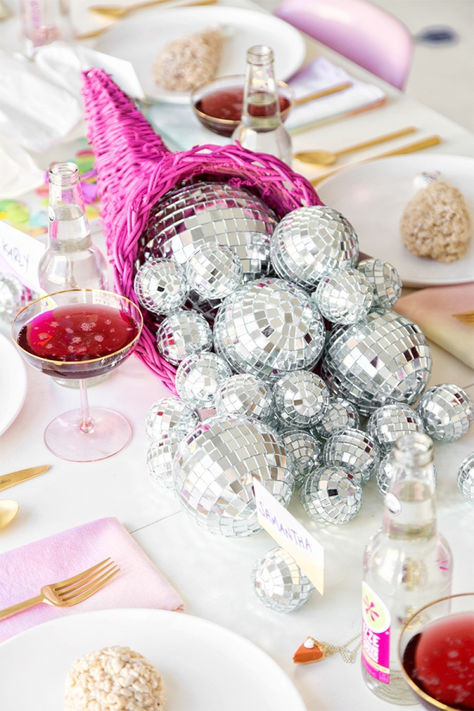 Throwback! | 5 Colorful Ideas for a Throwback Thanksgiving | Studio DIY® Retro Thanksgiving Decor, Colorful Thanksgiving Decor, Disco Ball Centerpiece Table Decorations, Disco Ball Tablescape, Disco Thanksgiving, Colorful Thanksgiving Table, Colorful Disco Party, Disco Dinner Party, Diy Disco Ball