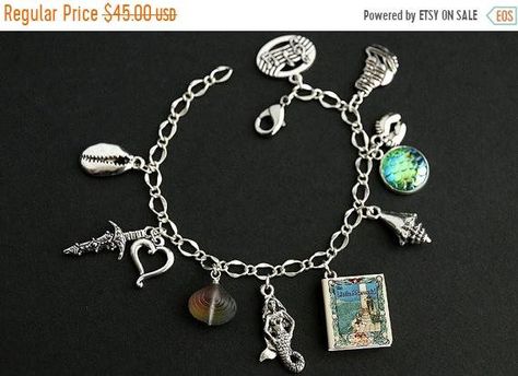 MOTHERS DAY SALE Little Mermaid Bracelet. Hans Christian Andersen Charm Bracelet. Fantasy Bracelet. Story Book Bracelet. Silver Bracelet. Ha by GatheringCharms from Gathering Charms by Gilliauna. Find it now at https://ift.tt/2pmxgnn! Little Mermaid Bracelet, Fantasy Bracelet, Book Bracelet, Mermaid Books, Handmade Charm Bracelets, Mermaid Bracelet, Hans Christian Andersen, Silver Plated Bracelet, Silver Jewellery Sets