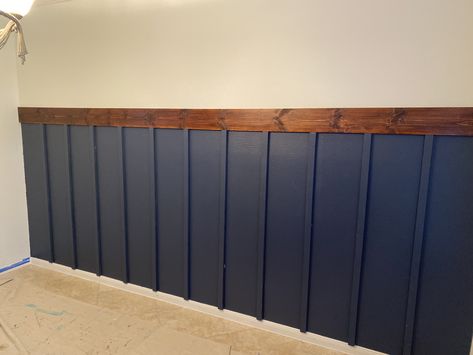 Navy Wood Paneling, Lower Wall Wood Paneling Ideas, Blue Beadboard Ceiling, Navy Blue Wood Panel Wall, Navy Wainscoting Hallway, Navy Batten Board Wall, Navy Blue Shiplap Wall Living Room, Navy Wall With Wood Slats, Navy Half Wall