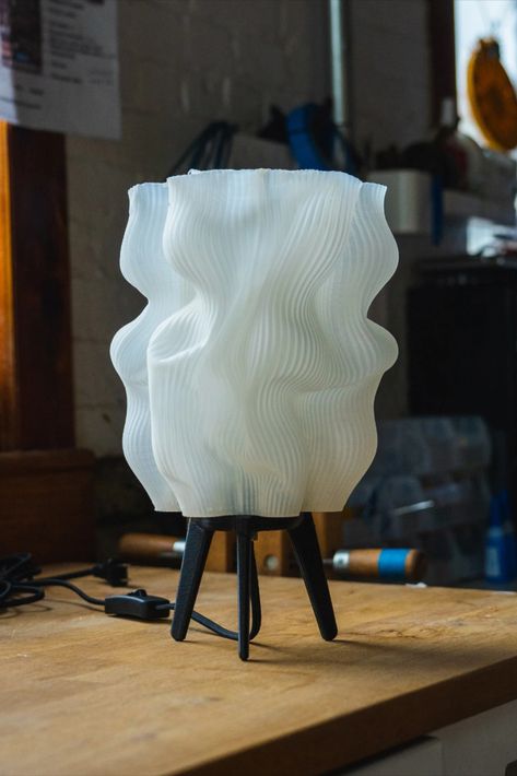 These distorted lamps by Wooj are truly one-of-a-kind. Each lamp is handmade and the fluid shaping process produces a lamp with it's own unique contours and shape. The folds create a distinct and organic look perfect for accentuating your living space. #Wooj #UniqueLamps #Lamps #LivingRoom #CoolLighting Smart Bulbs, Best Build, Pendant Fixture, Picture Collage Wall, Decorative Table Lamps, Lighting Design Interior, Hue Philips, Wall Plug, Good Design