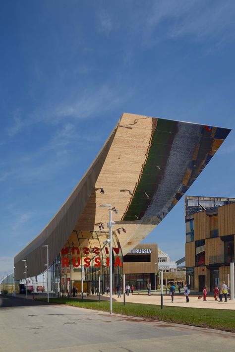 Located on the Expo’s main street Decumano, the Russia Pavilion for Expo Milano 2015 by Moscow-base architecture studio SPEECH is a 3,260 square meter building which features a 30-meter long floating entrance canopy with a curving mirrored underside. Pvc Canopy, Princess Canopy, Window Canopy, Canvas Canopy, Canopy Architecture, Canopy Bedroom, Backyard Canopy, Wedding Canopy, Canopy Frame