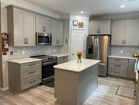 Cabinets were done in the Catalina shaker door in a beautiful pebble grey color. Kraftmaid Pebble Gray Cabinets, Pebble Grey Kitchen Cabinets, Pebble Grey Kitchen, Foxtail Palm, Kraftmaid Cabinets, Reno Kitchen, Light Gray Cabinets, Kitchen 2022, Pebble Grey