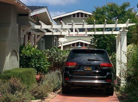 Pergola over driveway, wide open spacing. Small Parking Area In Front Of House, Trellis Over Driveway, Spanish Carport, Arbor Over Driveway, Pergola Over Driveway, Pergola Carport Front Of House, Pergola Driveway, Trellis Carport, Driveway Trellis