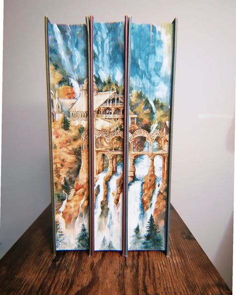 Watercolour fore-edge painting of Rivendell on new Waterstones edition of the Lord of the Rings books! I spent years mostly painting digitally, and I don't even remember when was the last time I painted something that's NOT a portrait, so I went through a lot of weird stages emotionally with this one 😂 Christmas gift for @impalei3 🧚‍♂️ 🧙‍♂️ #lotr #foreedgepainting #bookart #lordoftherings #bookseries #books #bookedges #bookedgepainting #weroni #bookstagram Book Edge Art, Foredge Painting, Painted Book Covers, Book Edge Painting, Lord Of The Rings Books, Fore Edge Painting, Bible Painting, Book Edges, Book Painting