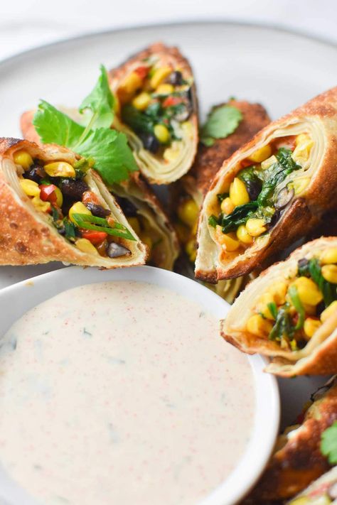 This recipe for air fryer southwestern egg rolls also gives you the traditional fried method and compares the two, plus lots of helpful tips and photos for rolling the egg rolls. It's so easy, you will love this vegetarian version of the Chili's appetizer! Vegetarian Egg Rolls, Southwest Egg Rolls, Dizzy Cook, Southwestern Egg Rolls, Air Fryer Recipes Vegetarian, Noodle Recipe, Egg Roll Recipes, Queso Dip, Vegetarian Appetizers