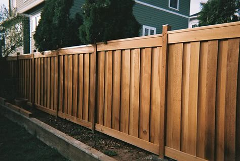 Overlapping fence boards offer a better privacy fence because gaps cannot emerge between shrinking, weathering boards. Fence Made Out Of Pallets, Fence With Pallets, Pallets Fence, Pallet Privacy Fences, Build A Privacy Fence, Fences Design, Privacy Fence Landscaping, Wood Privacy Fence, Wood Fence Design