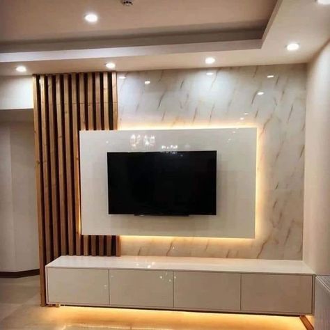 Tv Unit Design idea ✨️ #trendingpost #homedecor #interiordecorating #livingroomdesigns #interiors #reelitfeelit #tvunitdesigns #homedesignsdworld #interior #tvunit #livingroomdesign #wallpanels #interiordesign #fypシ゚viralシ2024fyp #newkitchenhacks #makeupaddict #tanremoval #papercraft #healthybodytips Diy Hiding Places, Tv Cabinet Design Modern, Tv Wall Ideas, Modern Tv Room, Tv Unit Furniture Design, Modern Apartment Design, Tv Unit Furniture, Tv Cabinet Design, Tv Unit Interior Design