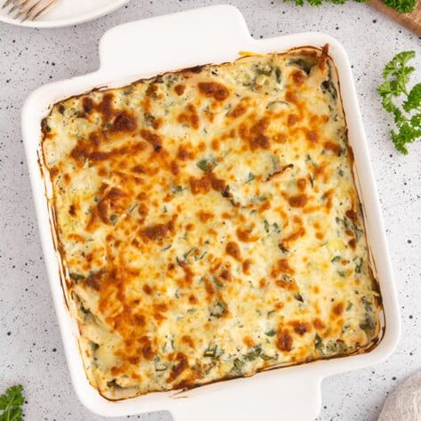 Spinach Artichoke Chicken Bake - The Clean Eating Couple Chicken Clean Eating, Spinach Artichoke Chicken Bake, Artichoke Chicken Bake, November Meals, Lemon Artichoke Chicken, The Clean Eating Couple, Clean Eating Couple, Neufchatel Cheese, Spinach Artichoke Chicken