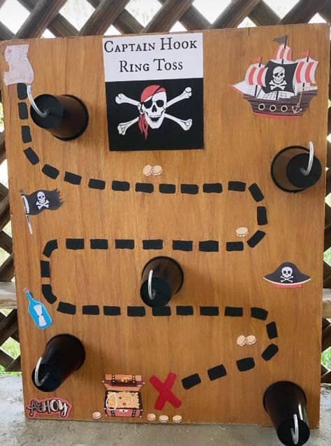 Pirate party game Pirate Themed Party Games, Pirate Themed Games For Kids, Captain Hook Ring Toss, Pirate Hook Ring Toss, Pirate Hook Toss Game, Walk The Plank Pirate Party, Hook Game, Pirate Party Games, Pirate Hook