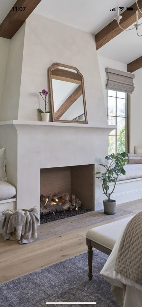 Cast Stone Fireplace Ideas, Spanish Chimney, Spanish Fireplace Mantle, Minimalist Spanish Interior, Architectural Digest Fireplace, Firebox Ideas, Fireplace Shapes, Modern European Fireplace, French Modern Fireplace