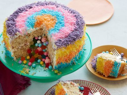 Stuffed Piñata Cake Recipe : Food Network Kitchen : Food Network Pinata Cake Recipe, Bright Cakes, Piñata Cake, Pinata Cake, Yellow Foods, 5 De Mayo, Pink Foods, Orange Recipes, Round Cake Pans